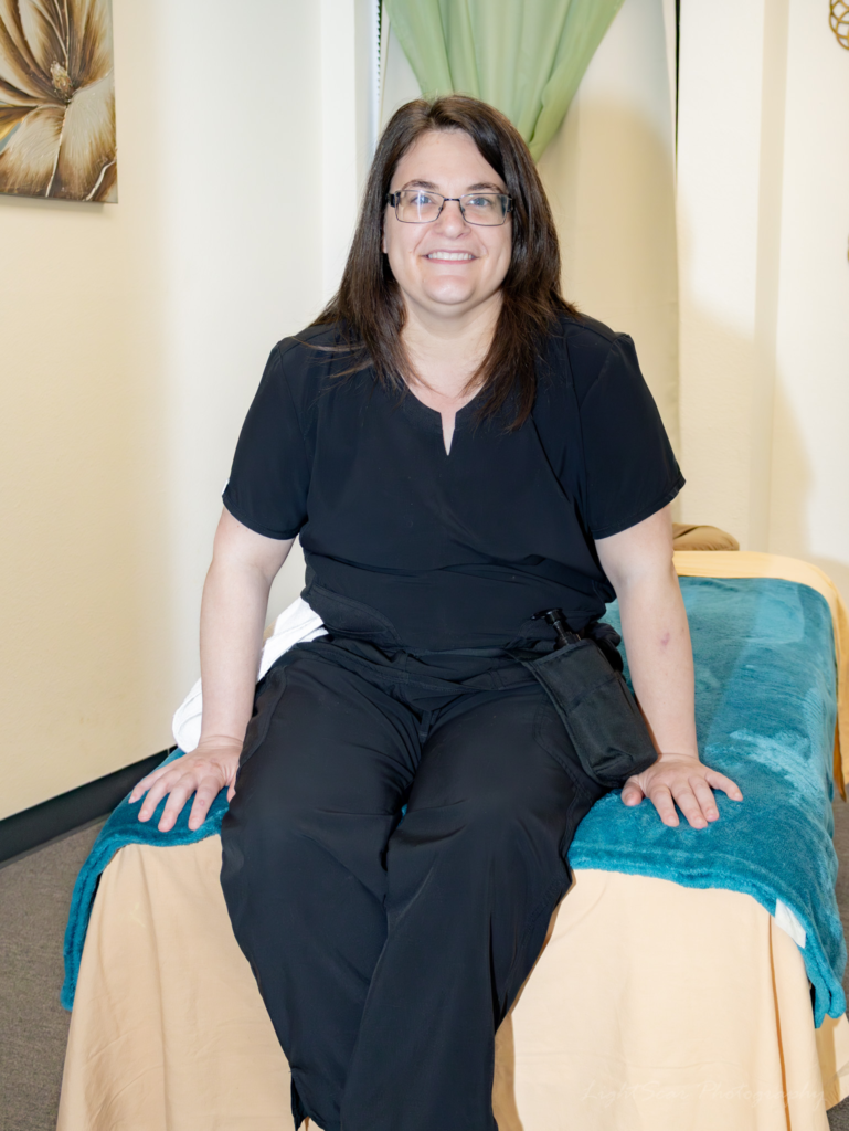 Massage therapist, Michelle L., using thoughtful techniques to support healing and recovery